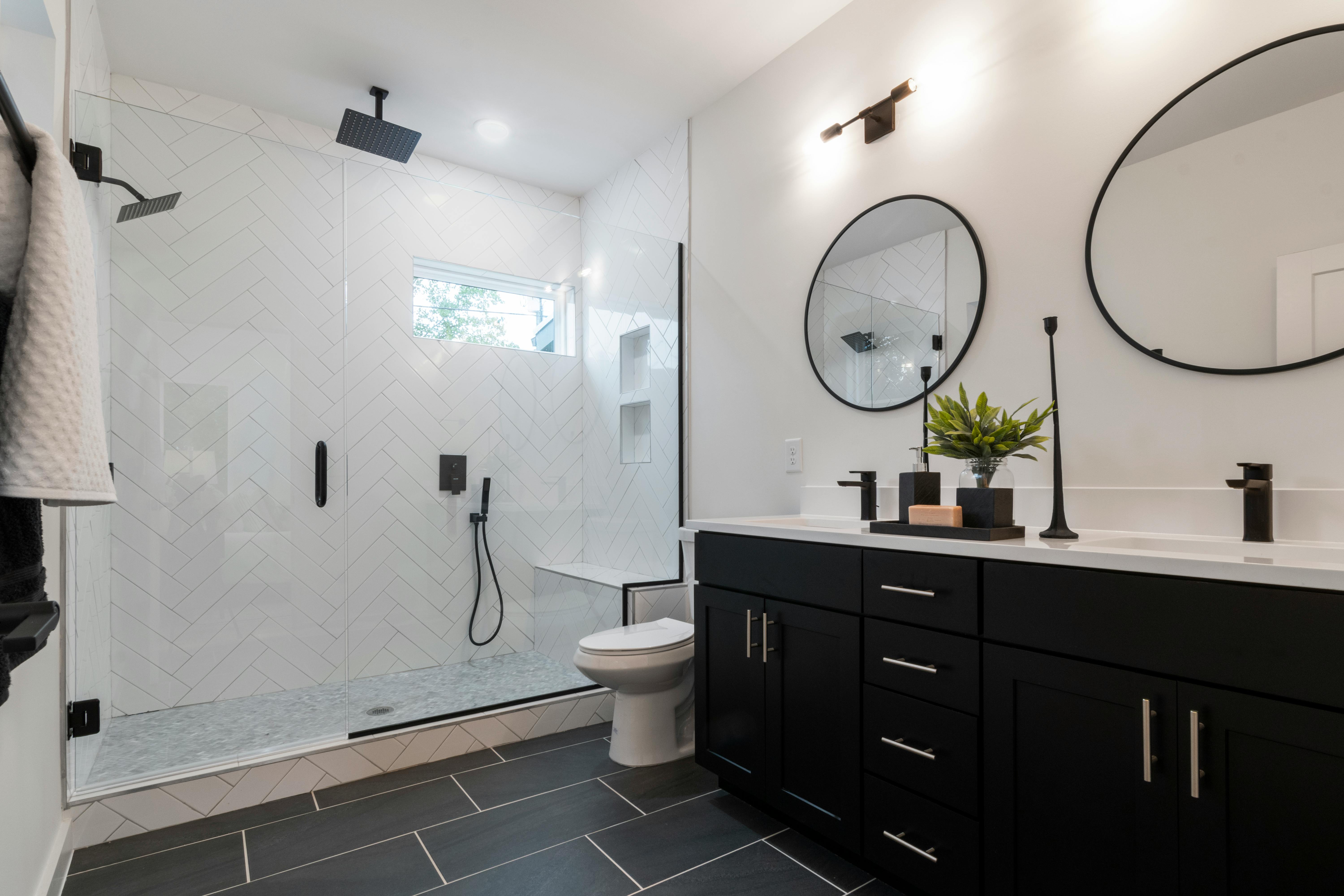 Elegant Shower Spaces with Black Frame Shower Doors