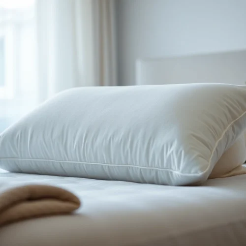 Experience comfort with tempurpedic breeze pillow, highlighted in a serene bedroom setting.